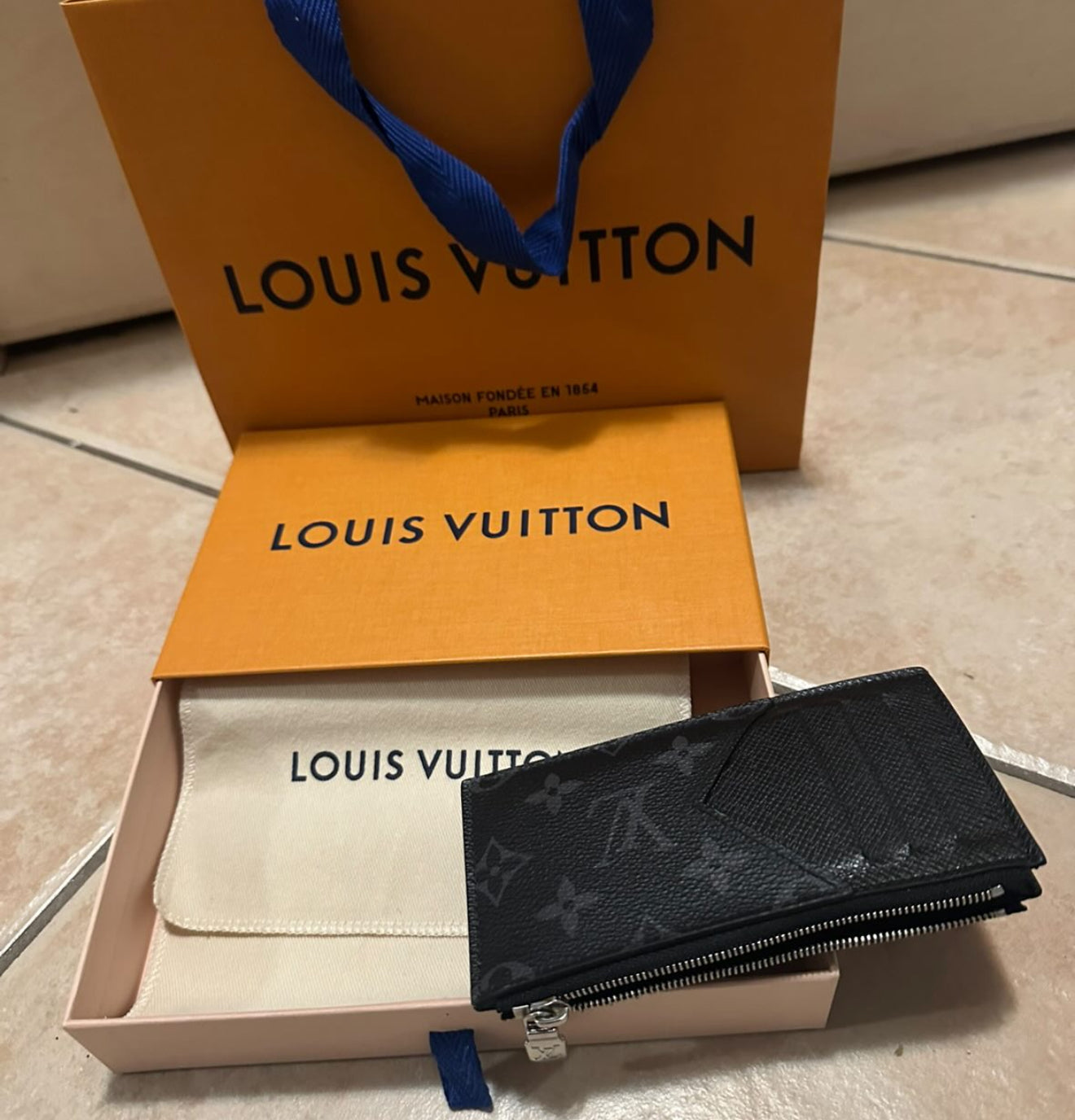Portamonete e porta carte di credito Louis Vuitton
